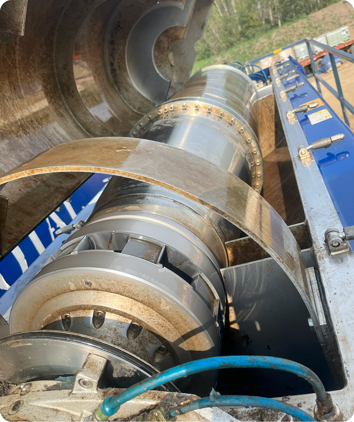 Large industrial machinery with metal components outdoors.